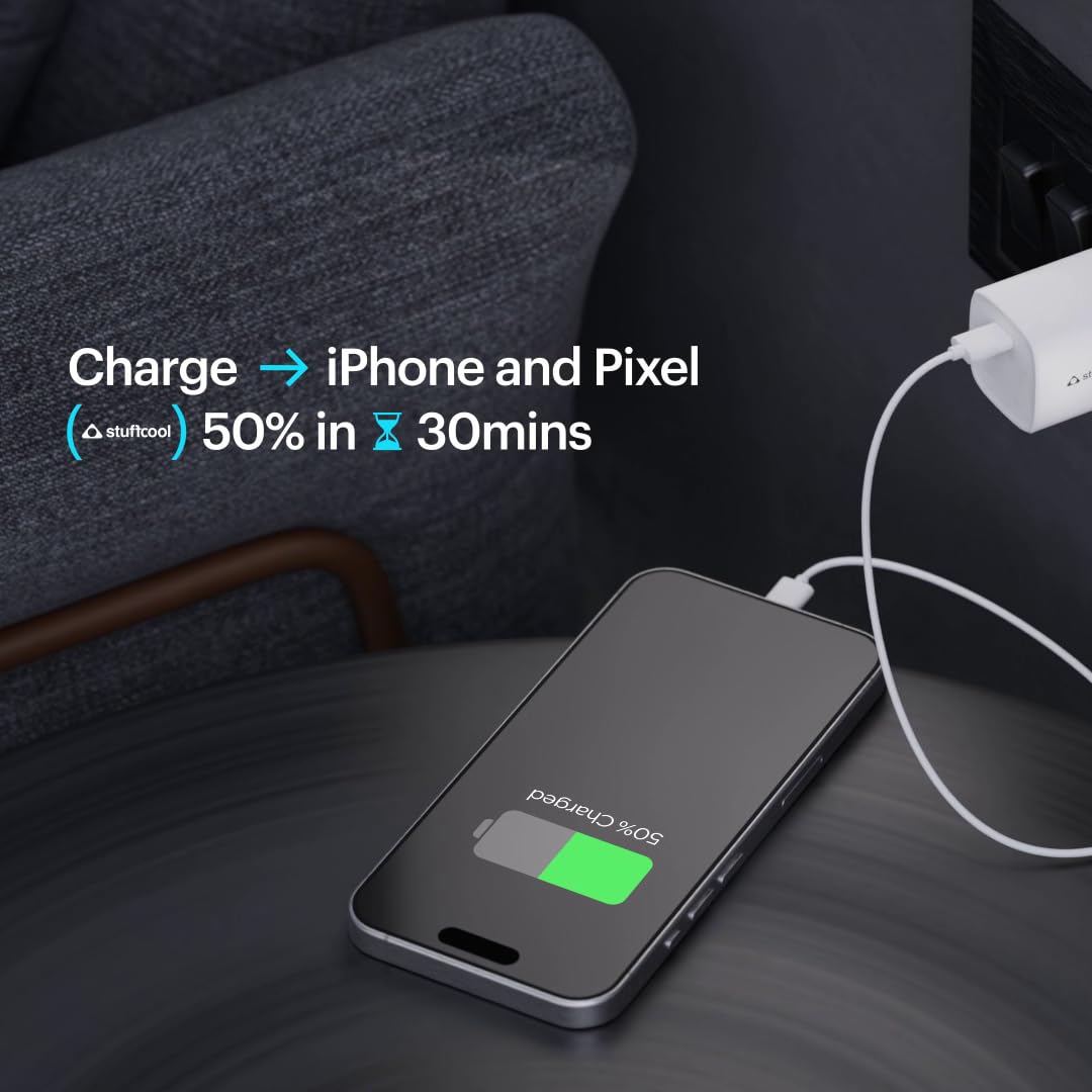 A smartphone charging scene in a car interior, with a white power adapter plugging into a port and a phone lying on a dark table. Text on the image says it can charge iPhone and Pixel and shows a 50% charge in 30 minutes.