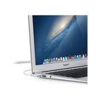 A silver Apple MacBook Air laptop shown at an angle with its screen turned on, displaying the desktop and dock, on a white background.