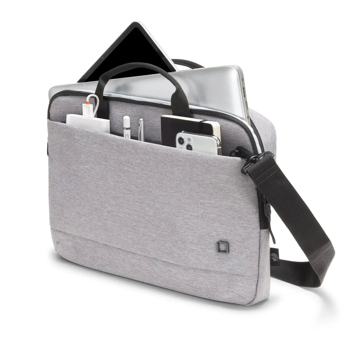 Gray shoulder bag with black strap containing electronic devices on a white background