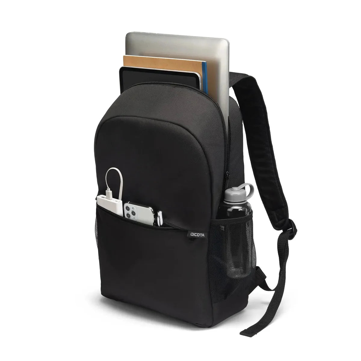 Black backpack with laptop and items on a white background