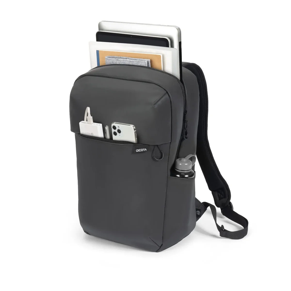 A dark gray backpack shown on a white background, filled with a laptop, notebooks, a tablet, cards, a phone, and a water bottle. The brand name 'GEO' is visible on a small tag on the front pocket.