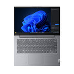 Laptop with a blue abstract design on the screen on a white background