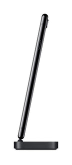 A black tablet shown from a side profile view, resting on a matching black charging dock against a plain white background.