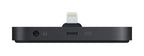 A black rectangular electronic dongle with a Lightning connector plugged into the top center, shown from the side on a plain white background.