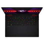 A black MSI gaming laptop shown open from a top-down angle, featuring vibrant RGB backlit keys and a matching RGB lighted screen border with red and purple chevron patterns.