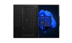 Black laptop with a visible keyboard and screen displaying abstract blue design on a white background