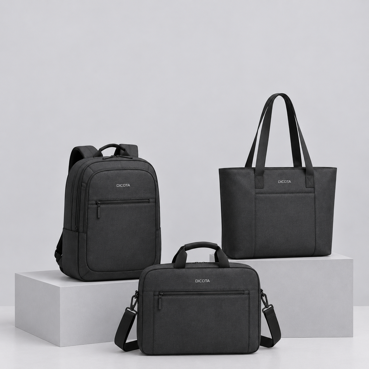 A black Delsey backpack with a front zippered pocket and top handle, photographed against a solid white background.